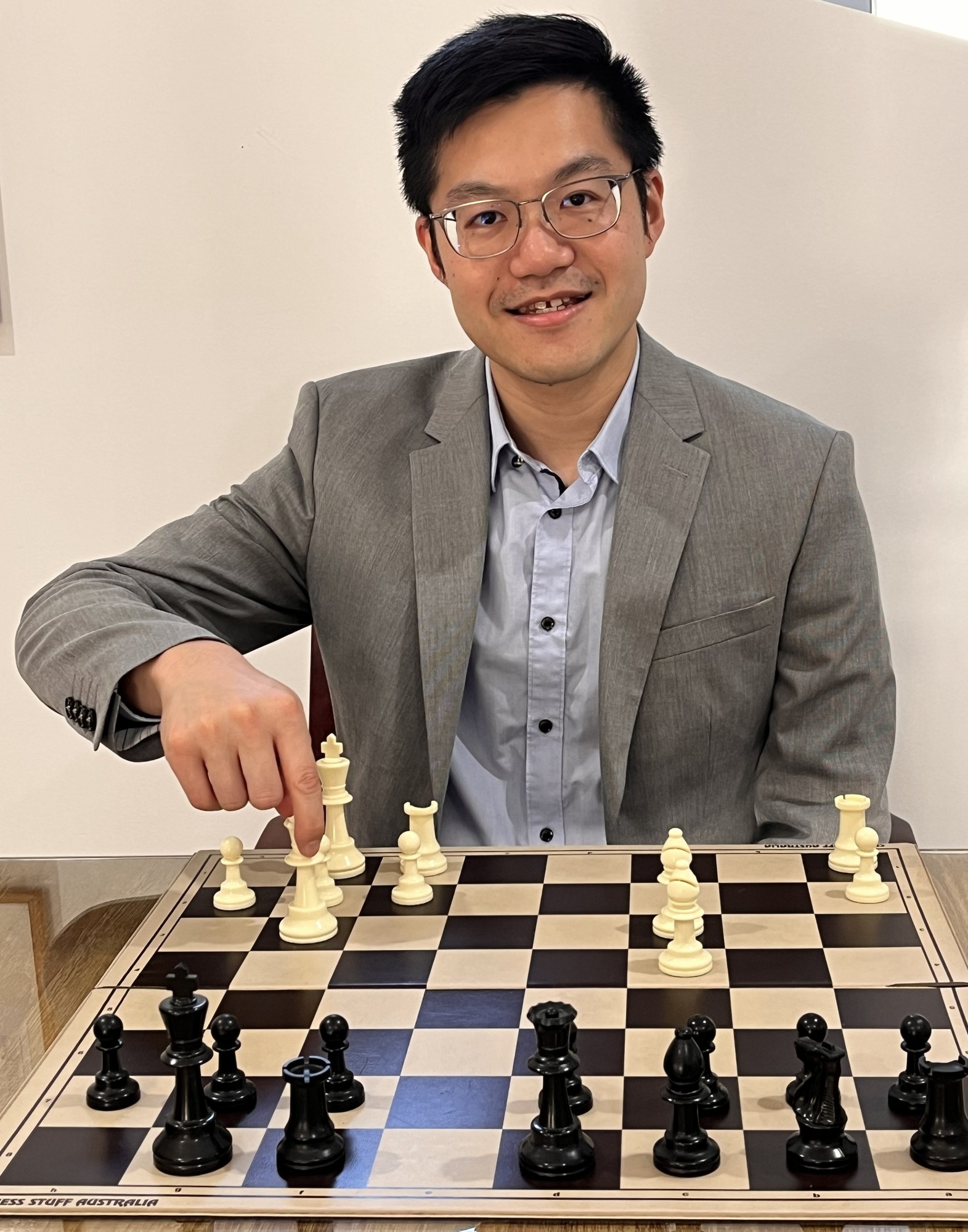 Ross Lam at the chessboard